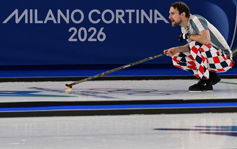 Olympics-Curling-Fancy pants Norway pay tribute to Ulsrud at Winter Games