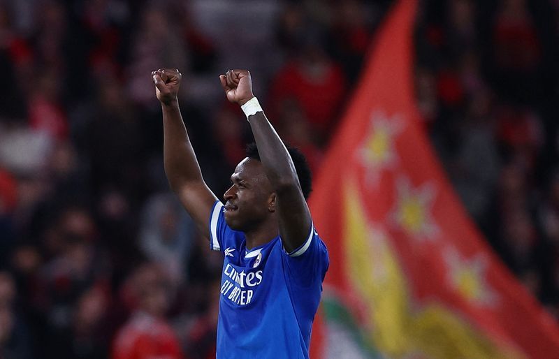 Soccer-Vinicius earns Real 1-0 win at Benfica in match marred by racism row