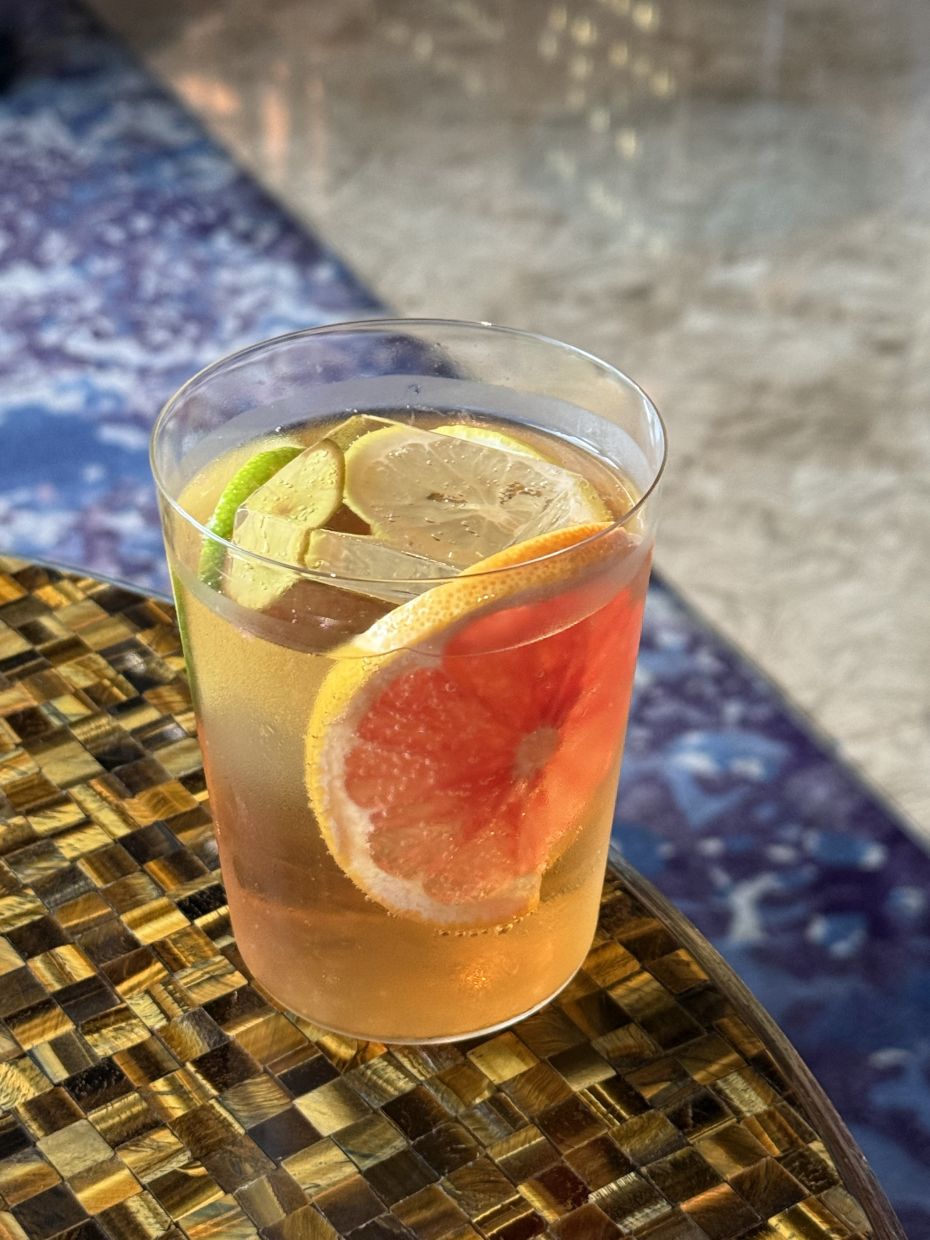 Rubi takes the Paloma to another level by using lager beer to clarify the cocktail.