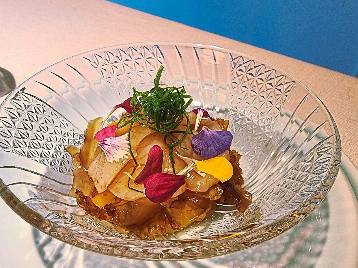 Fat slices of jellyfish and scallop take centre stage in this vibrant, energetic meal opener. — Photos: ABIRAMI DURAI/The Star