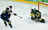 Olympics-Ice hockey-Sweden beat Latvia to set men's quarter-final meeting with US