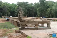 Ancient temple's causeway in Cambodia's Angkor complex regains beauty after restoration