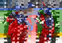 Olympics-Ice hockey-Czech Republic down Denmark to set up Canada meeting in quarters