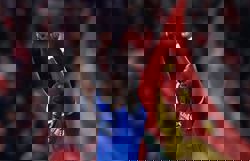 Soccer-Vinicius earns Real 1-0 win at Benfica in match marred by racism row