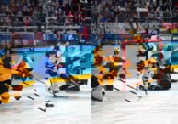 Olympics-Ice hockey-Slovakia muscle past Germany into semi-finals