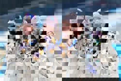 Olympics-Biathlon-Simon anchors dominant France to gold in women's relay at Milano Cortina Games