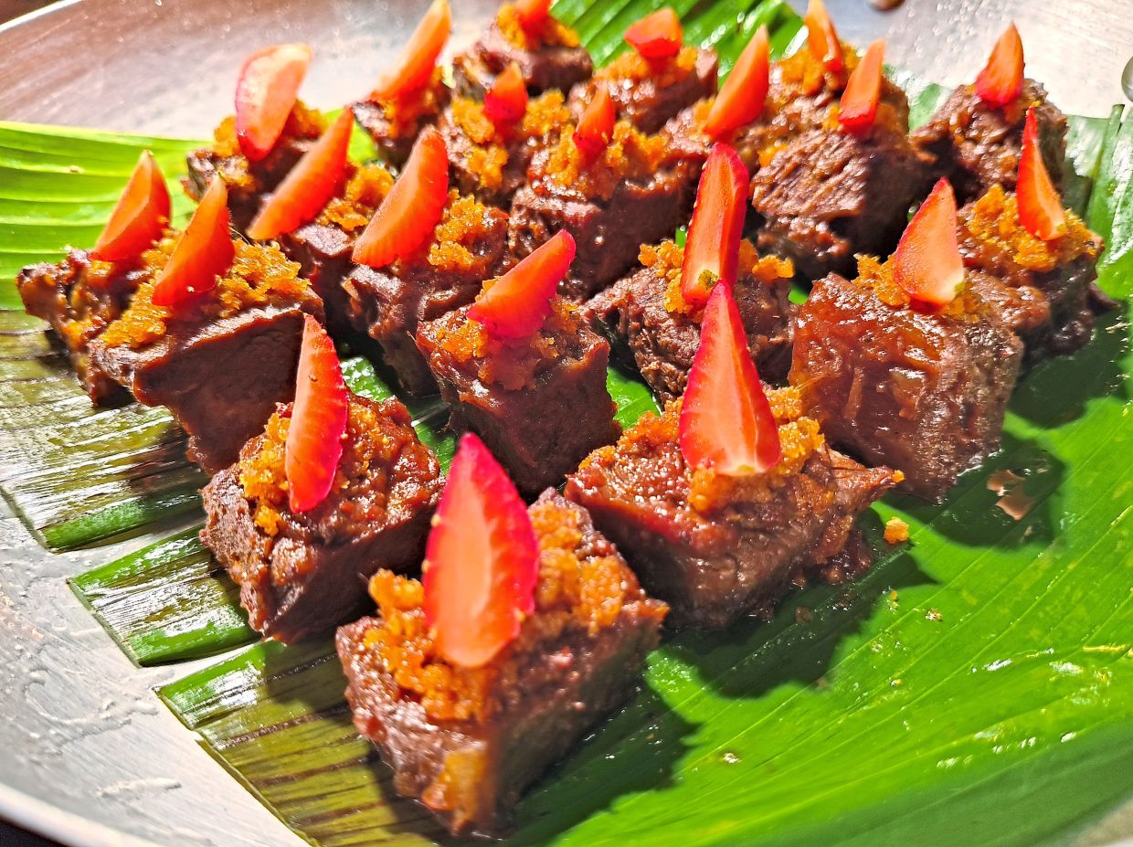 Slow-baked Short Ribs with Coconut Floss and Sambal Strawberry.