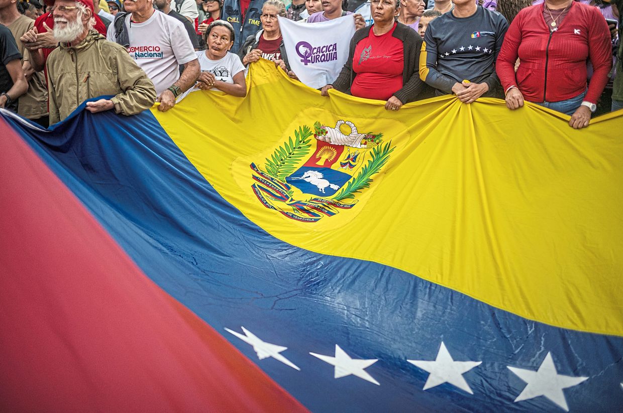 Maduro’s supporters protesting his capture and imprisonment in Caracas, Venezuela, in this file photo. — Alejandro Cegarra/The New York Times 