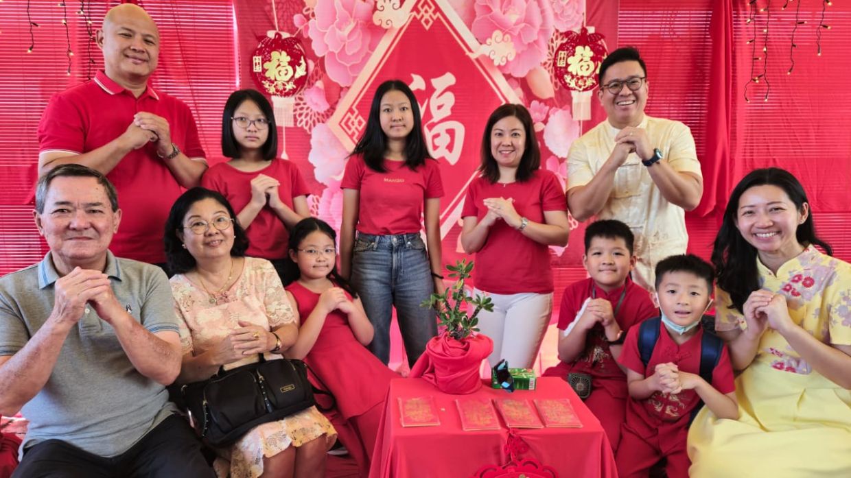 These Malaysian families celebrating CNY view superstitions as a tool for unity