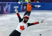 Olympics-Short track-Canada's Dubois holds off Dutch brothers to win 500 metres