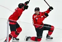 Olympics-Ice hockey-Canada play defending champions Finland, US meet Slovakia in men's semi-final showdowns after OT drama