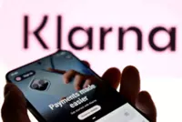 Sweden's Klarna swings to loss as fast growth hikes costs, shares fall 23%