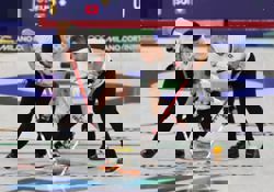 Olympics-Curling-Switzerland's Schwaller following in father's footsteps at Winter Games