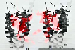 Olympics-Ice hockey-Canada survive OT thriller with Czechs to reach men's semis