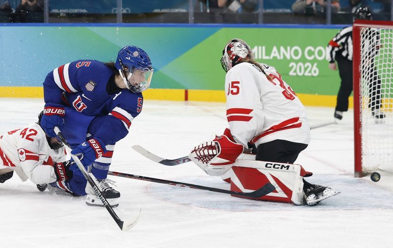 Olympics-Ice hockey-United States beat Canada in overtime for women's gold