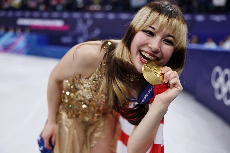 Olympics-Figure skating-Liu's golden skate caps joyful comeback story