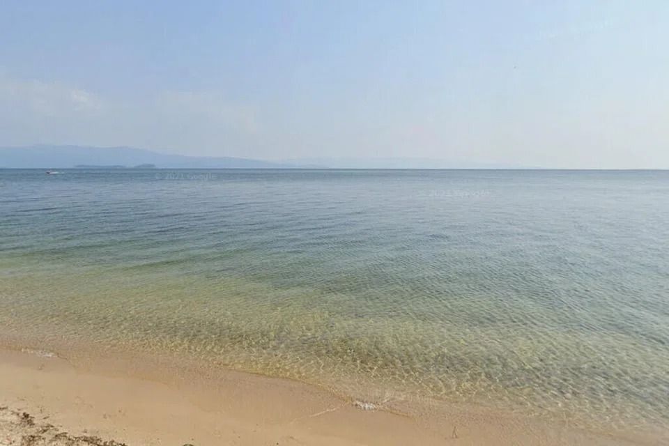 Eight feared dead after a bus with Chinese tourists sinks into Russia's Lake Baikal