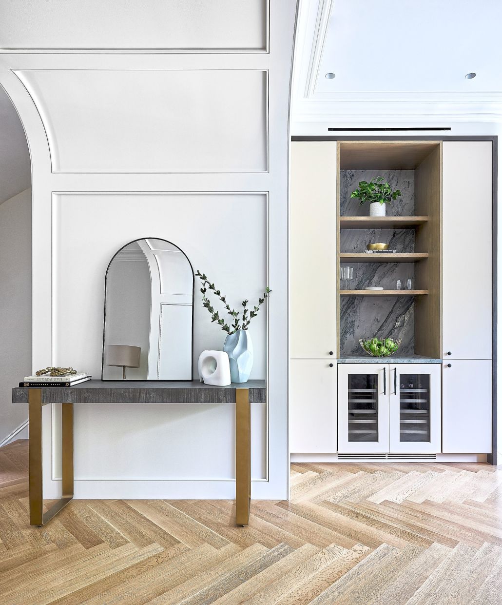 Greenery such as a house plant and affordable stems add a sense of approachable luxury.