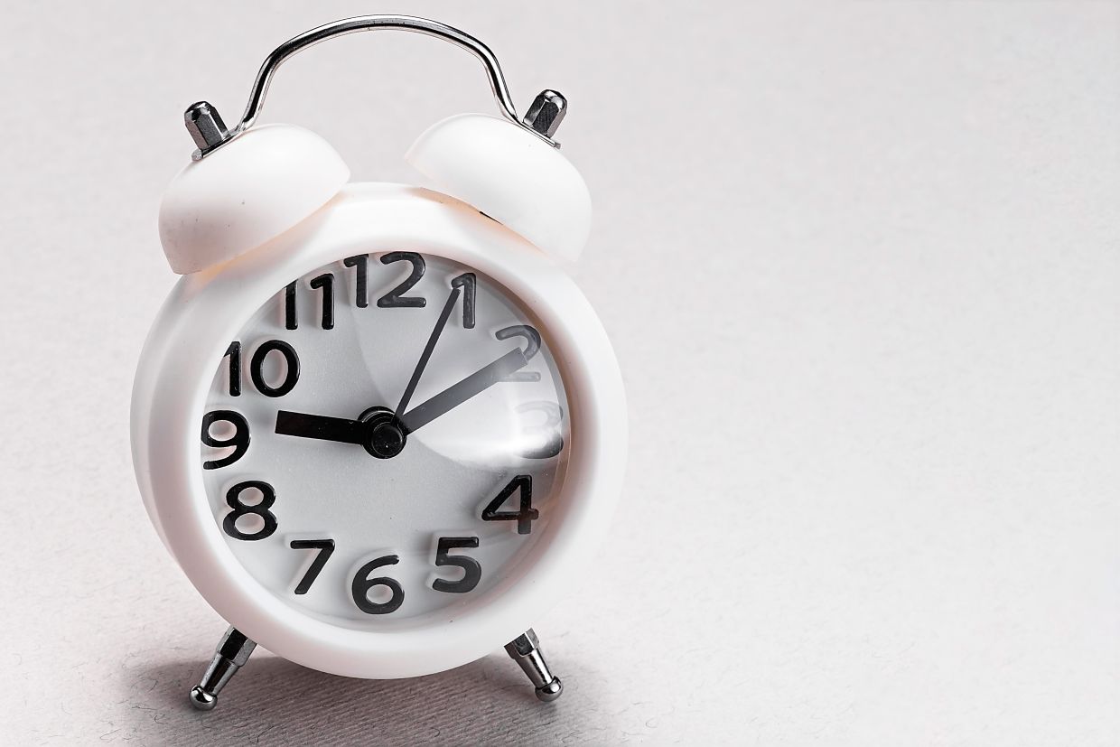 Set an alarm to go off an hour before your bedtime every night; this reminds you that it’s time to start getting ready for sleep.