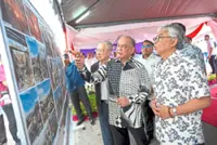 Karak fire victims move into new homes for CNY