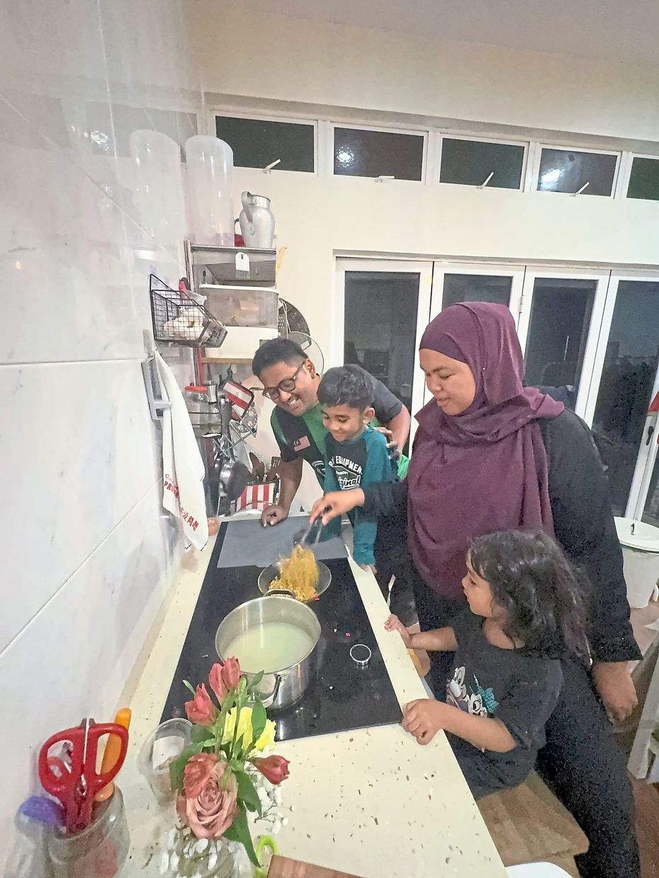 Mohamad Faiz and Ku Nur Fadzilah cook their buka puasa and sahur meals every day during Ramadan.