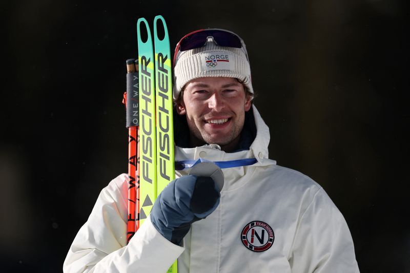 Olympics-Biathlon-Norway's Laegreid signs off with fifth medal at Milano Cortina Games