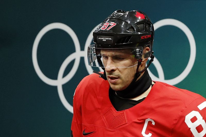 Olympics-Ice hockey-Sidney Crosby on Canada's mind in semi-final win over Finland