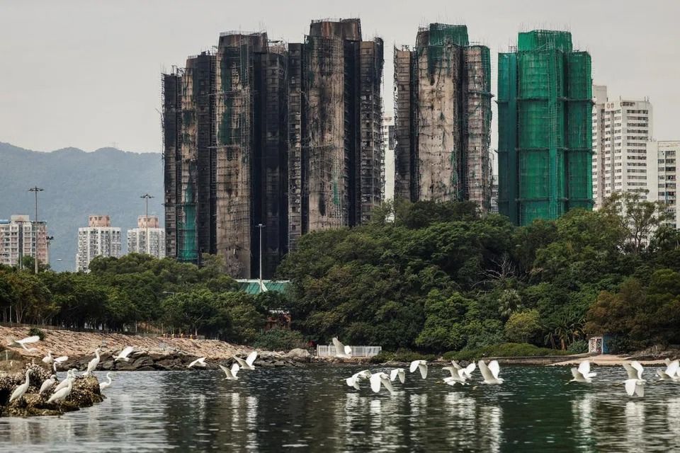 Hong Kong plans to buy homes devastated in deadly high-rise fire