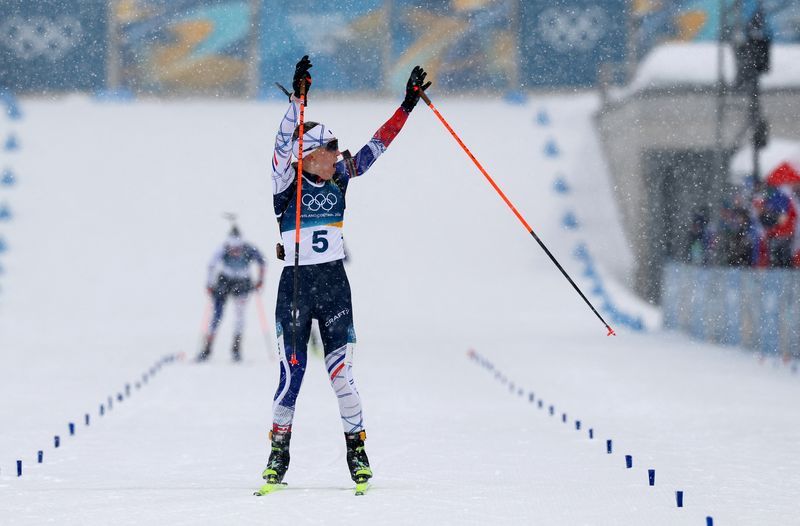 Olympics-Biathlon-Michelon's stunning last lap delivers women's mass start gold for France