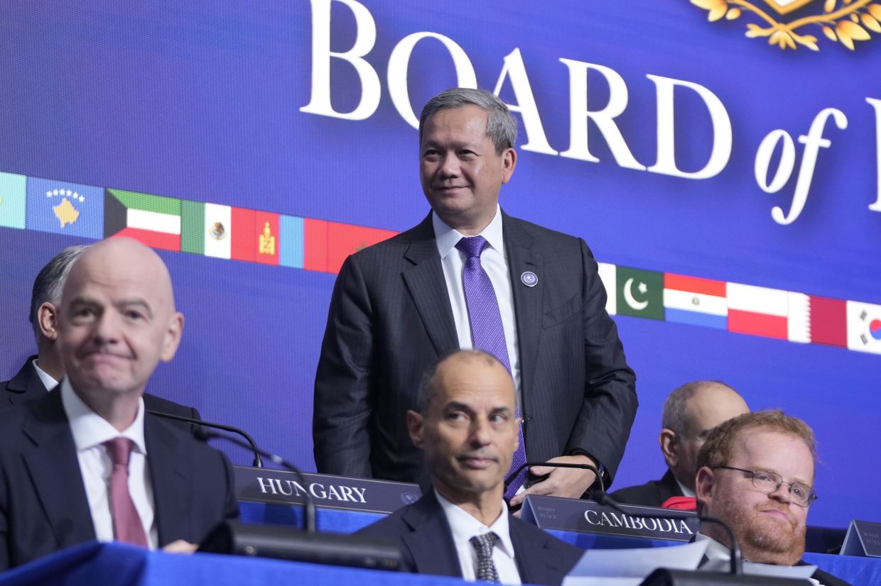 Cambodian Prime Minister Hun Manet is recognized during a Board of Peace meeting at the US Institute of Peace in Washington. -- AP Photo/Mark Schiefelbein