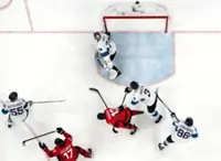 Olympics-Ice hockey-Canada fight back to beat Finland, reach men's gold medal game