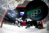 Olympics-Ice hockey-Canada fight back to beat Finland, reach men's gold-medal game