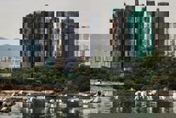 Hong Kong plans to buy homes devastated in deadly high-rise fire