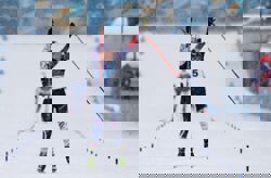 Olympics-Biathlon-Michelon's stunning last lap delivers women's mass start gold for France