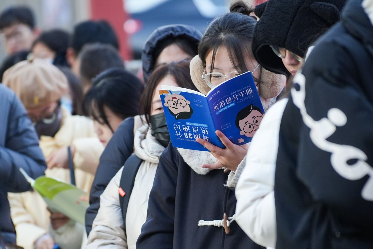 In China’s tight economy, a fake exam-takers scheme has touched a nerve