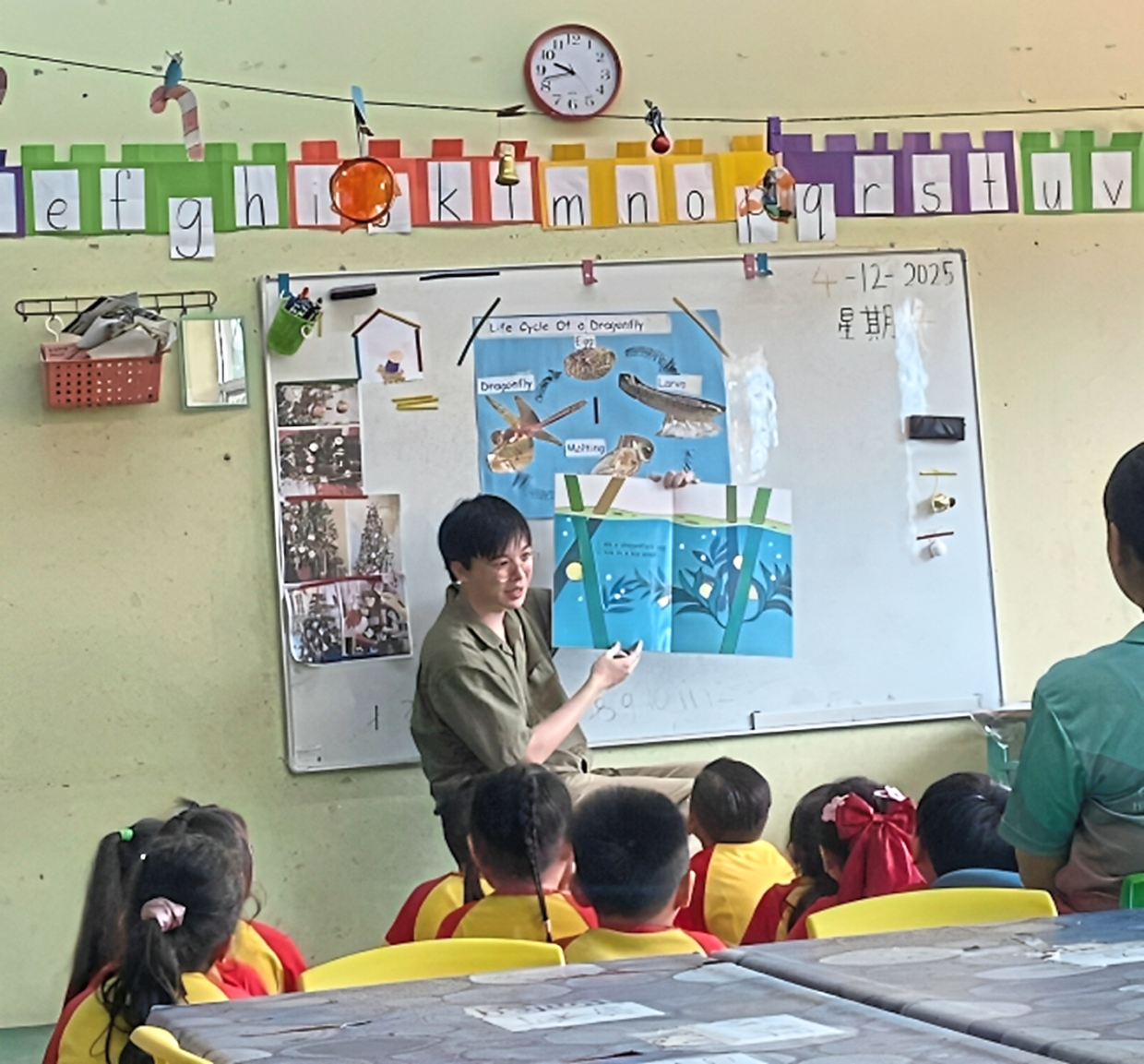 Storytime in motion: A teacher conducting a session with preschoolers using one of the picture books.