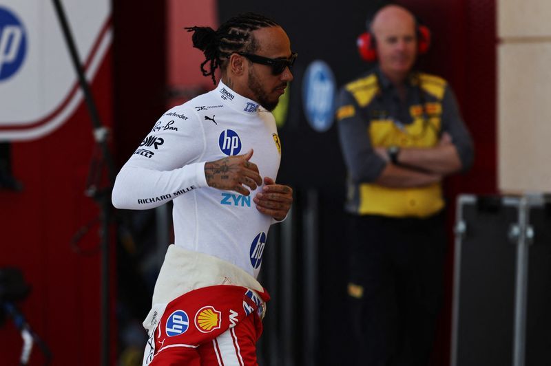 Motor racing-Hamilton says he forgot who he was but has re-set for new season