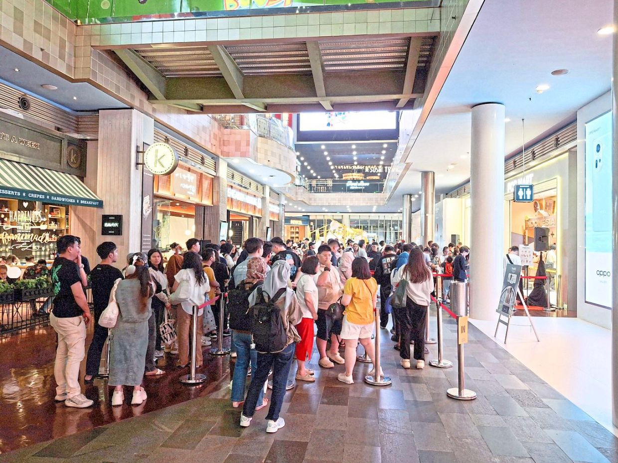 Customers at Pop Mart in South Jakarta queueing for plush toys from Labubu, made popular by BLACKPINK’s Lisa. — Shutterstock