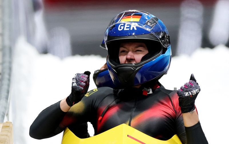 Olympics-Bobsleigh-Germany's Nolte holds nerve to retain Two-Woman title