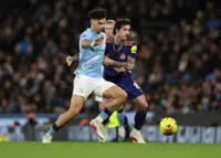 Soccer-O'Reilly double gives Man City win and turns heat on Arsenal