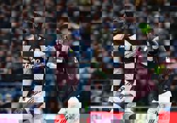 Soccer-Villa and Chelsea drop points, Milner breaks Premier league record