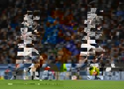 Soccer-O'Reilly double as Man City win to turn heat on Arsenal