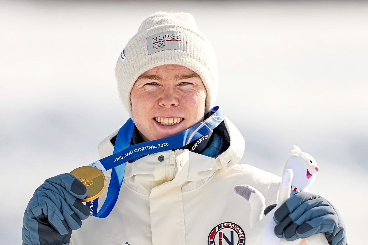 Norway's Jens Luraas Oftebro poses after winning the gold medal in the nordic combined individual Gundersen large hill/10km. The country’s model is designed to keep children in sport by protecting their enjoyment rather than pressuring them to win. Photo: AP