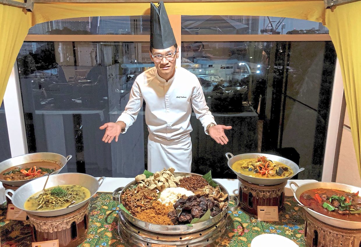 Mohd Fahmi ensures authentic flavours are achieved with fresh ingredients.