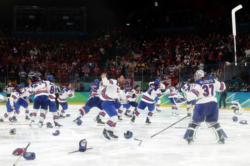Olympics-Ice hockey-Hughes the slayer and Hellebuyck the hero in US triumph over Canada