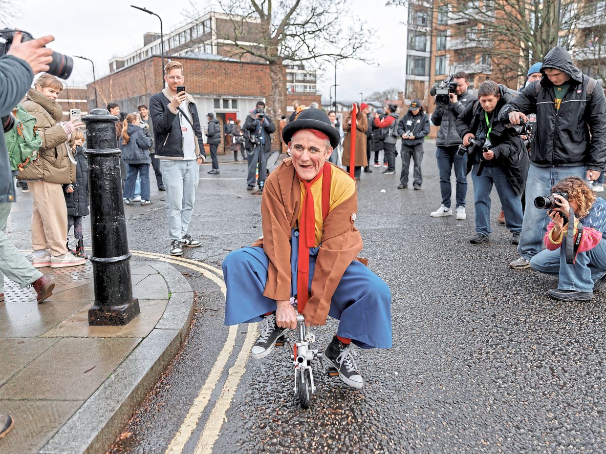 Tweedy, who runs his own circus, arrives at All Saints Church.