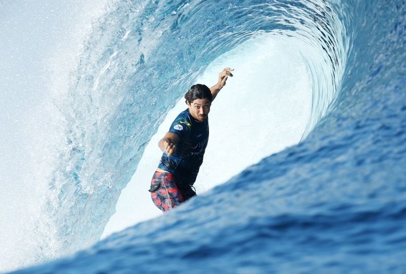 Surfing-World champion says many top tour surfers unhappy with Olympic qualification tweaks