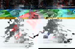 Olympics-Ice hockey-US claim long-awaited gold by beating rivals Canada in overtime thriller