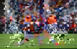 Soccer-Barcelona return to LaLiga summit with 3-0 win over Levante