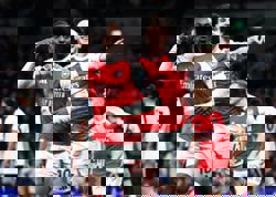 Soccer-Eze's derby double gets Arsenal title bid back on track